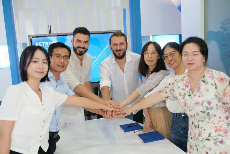 The Shenzhen team meeting with the founders